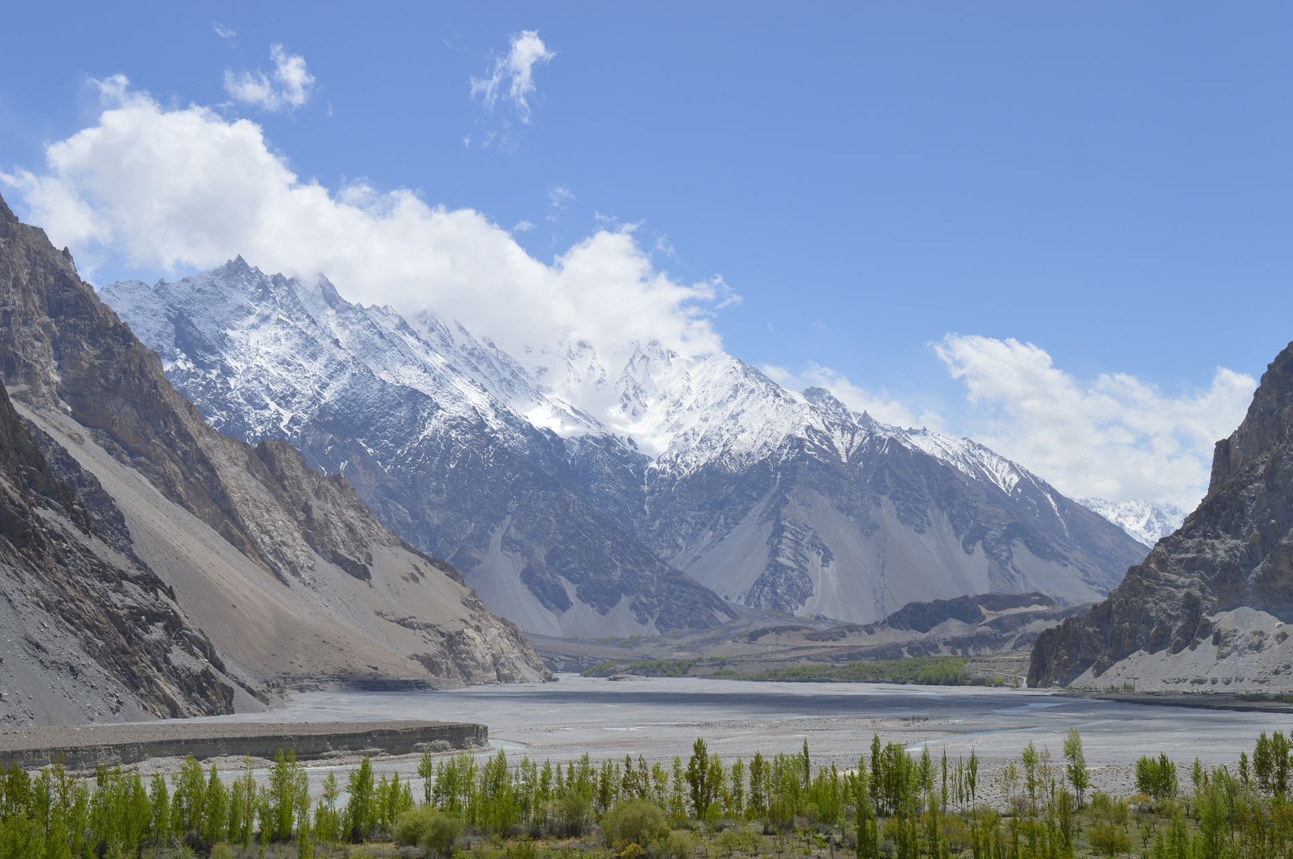 Baltit Fort perched above the Hunza Valley with Ultar Sar glacier behind it