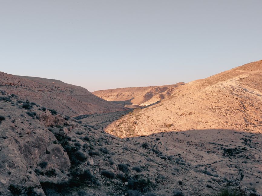 View down into the deep, dry Kidron Valley canyon from the monastery terrace