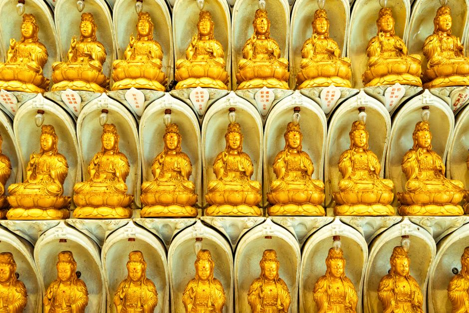 The 30-meter bronze Kuan Yin statue under its pavilion at the temple's upper tier