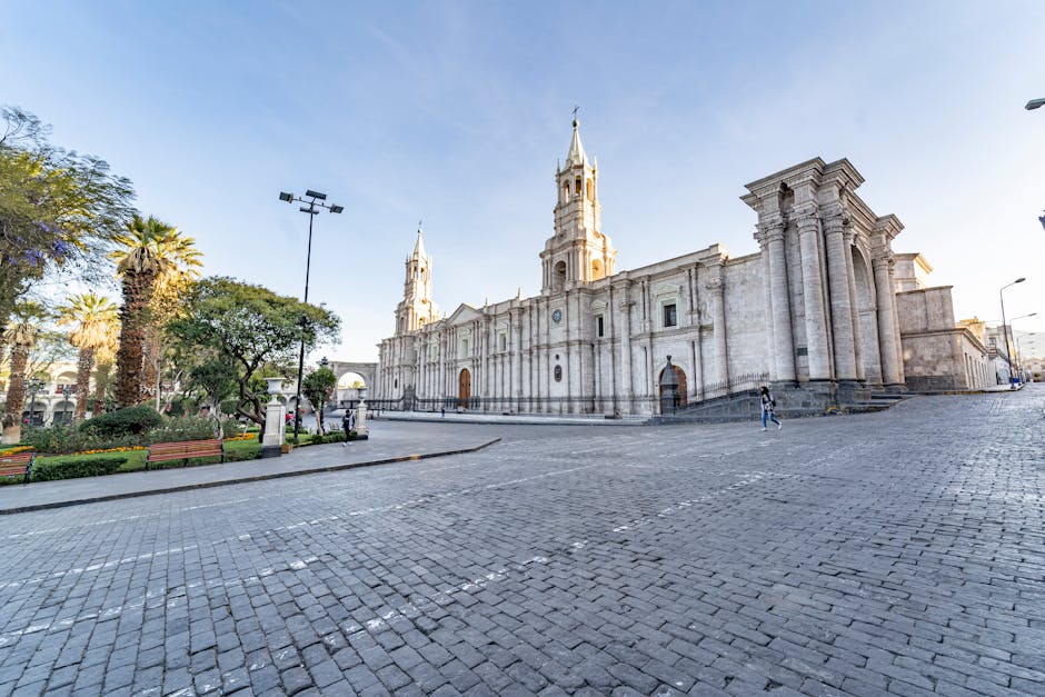 El Misti volcano rising above Arequipa's terracotta rooftops at golden hour