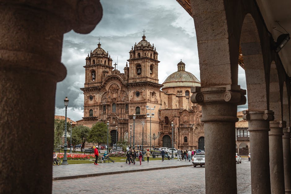 Cusco's colonial architecture and cobblestone streets in warm light