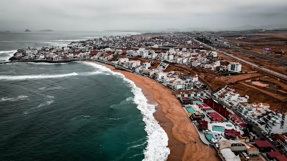 Lima's coastal cliffs and the Pacific Ocean at golden hour
