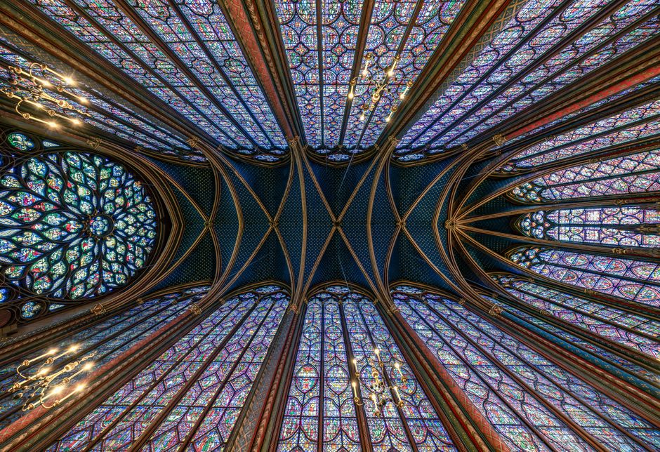 Star-vaulted ceiling of the founder's chapel at Batalha Monastery with royal tombs lit by soft daylight
