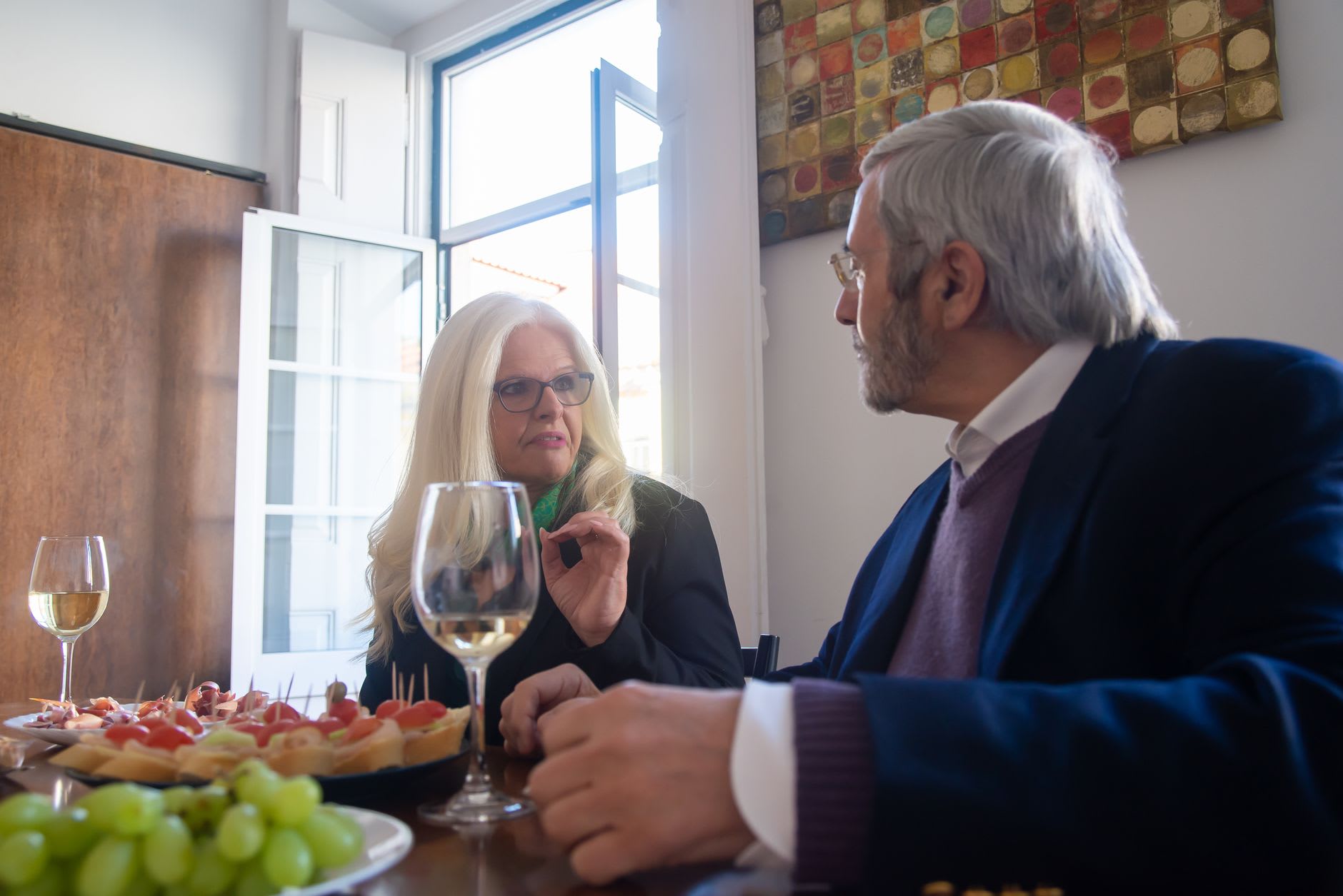 Traditional Portuguese Minho pork dish served with wine on a rustic table, the kind of meal that tastes better in the cold