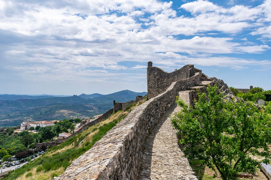 View from Marvão's medieval castle ramparts across the Alentejo plains toward the Spanish border
