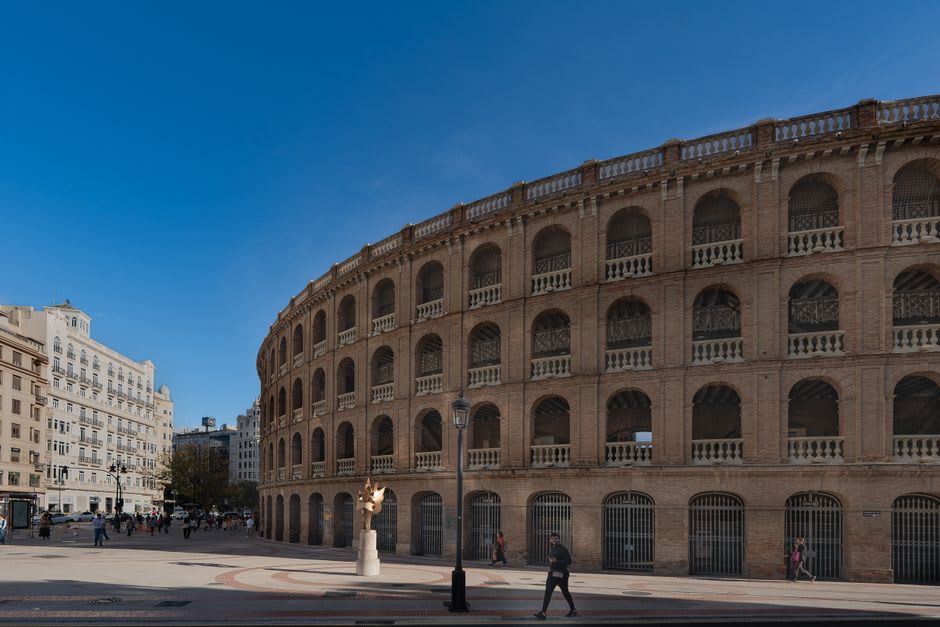Stone-walled bullring built into the corner of Monsaraz's main square