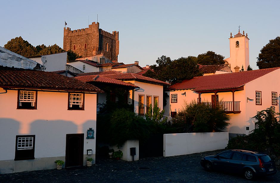Stone village houses in Montesinho Natural Park surrounded by oak forest at dusk