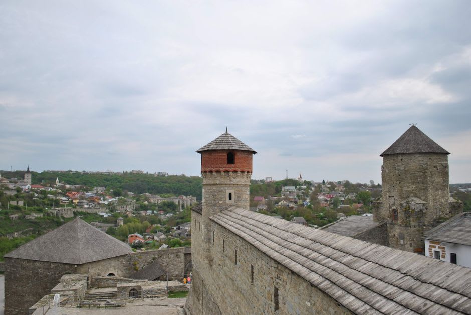 Stone ramparts and grassy embankments of the Citadelle with a view over the rooftops of Old Quebec