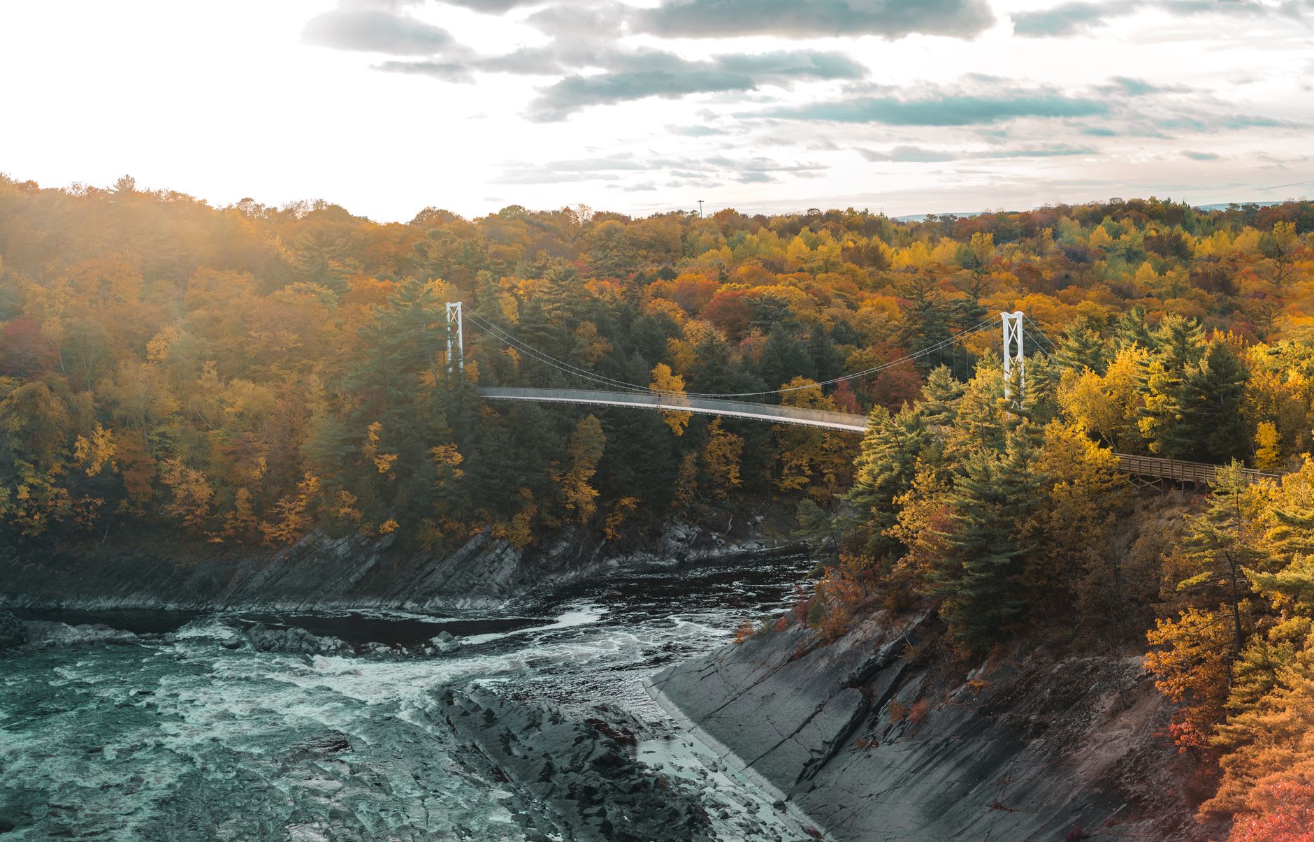 Montmorency Falls at full force in spring, the water thundering into the gorge and spray catching the light