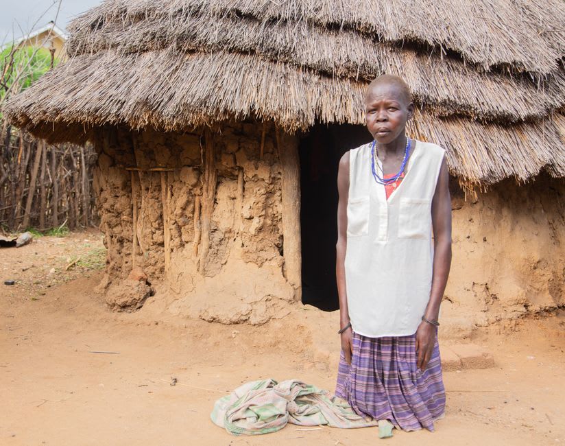 Interior of the thatched royal residence at Nyanza with woven walls