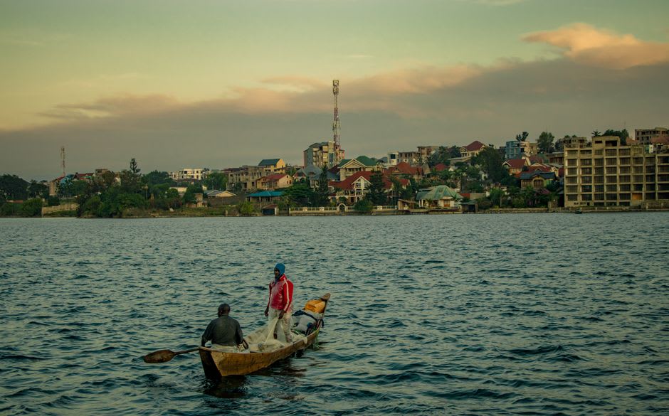 Sunset light over the Rusizi River with Bukavu visible on the Congolese side