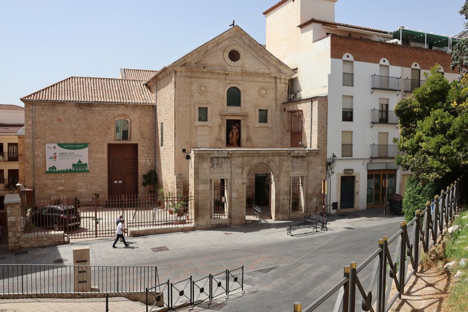 The weathered Gothic cathedral facade in the historic center of Iglesias