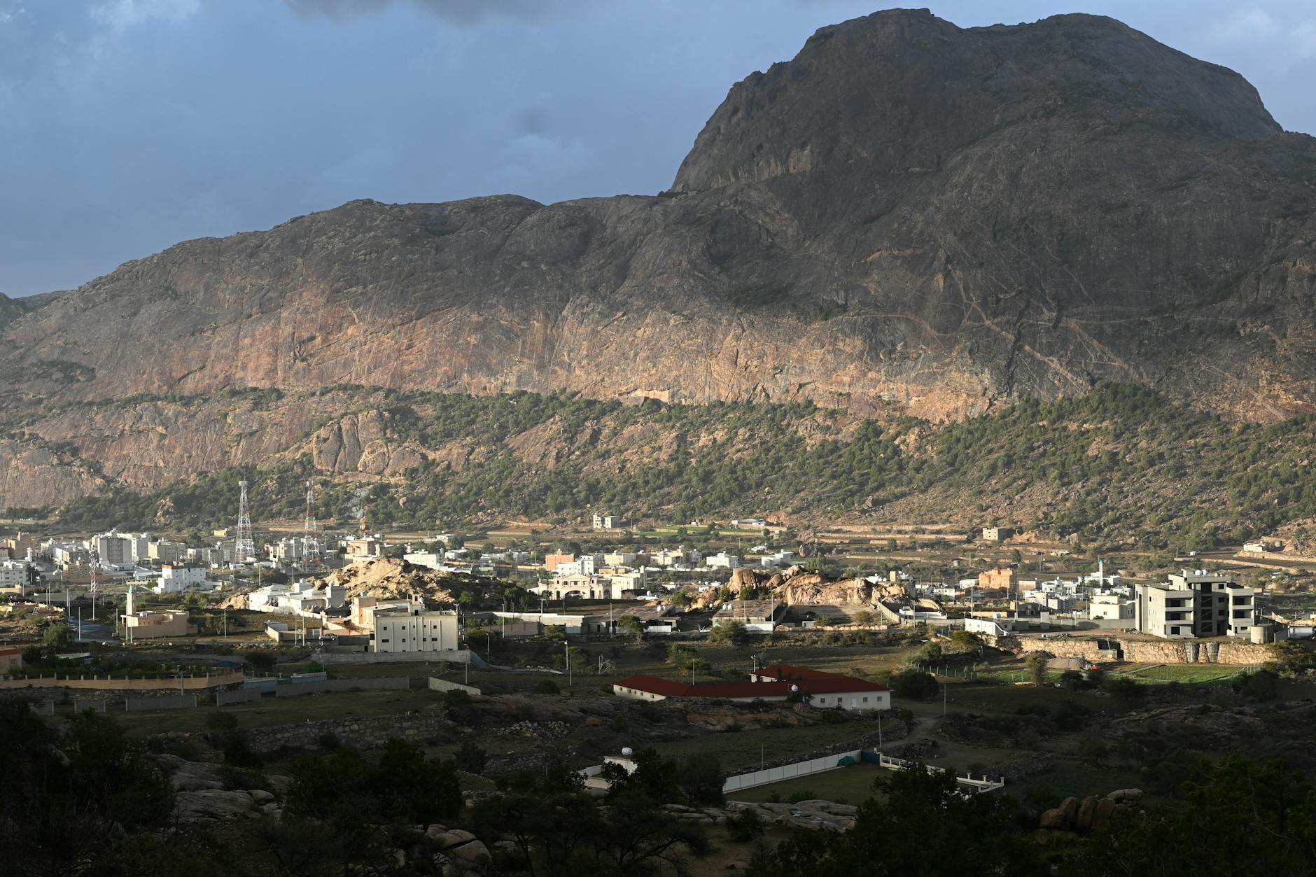 Misty green highlands and terraced mountains in the Asir region