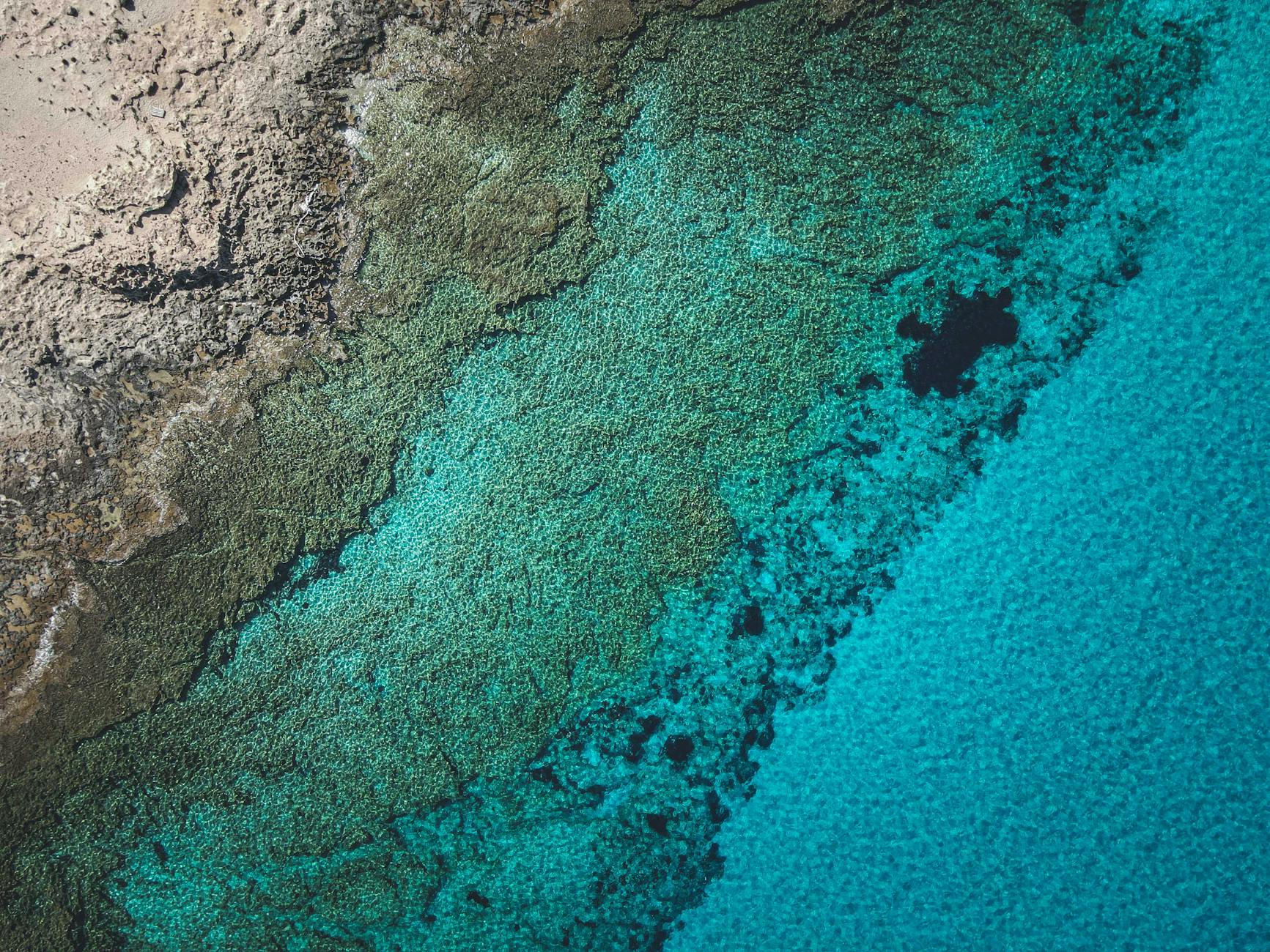 Desert mountains meeting the Red Sea coast in northwest Saudi Arabia