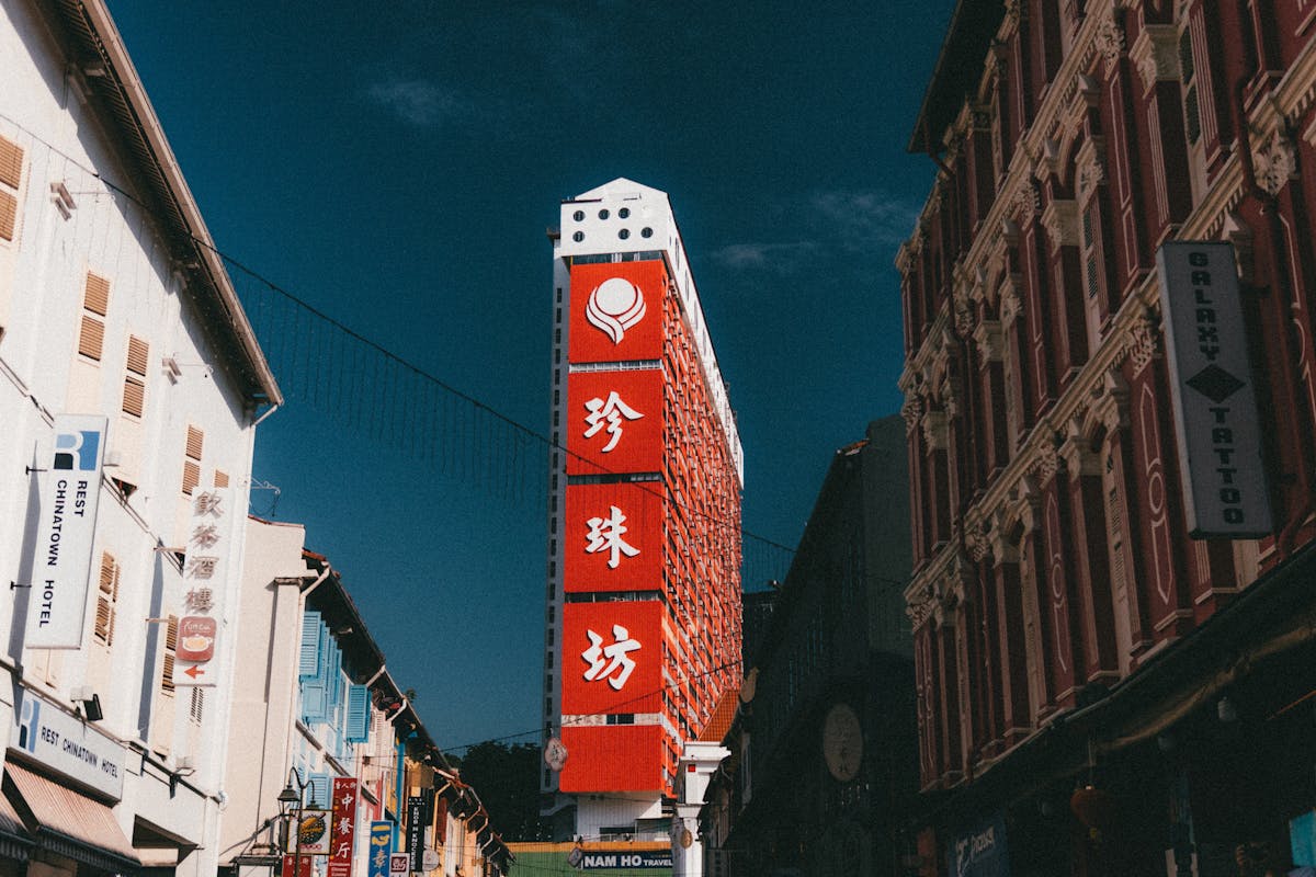 A traditional Chinese temple facade amid the heritage shophouses of Chinatown