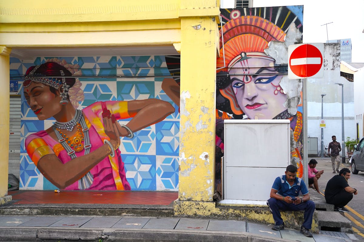 A colourful street scene in Little India with traditional shops and decorations