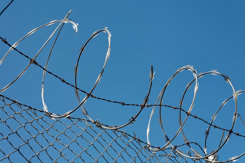 Barbed wire fence along the Korean border with ribbons of peace