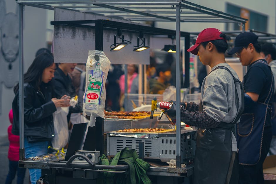 Korean street food stall with vibrant dishes