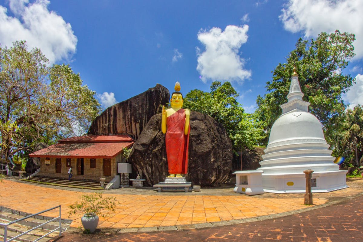 Ancient white stupa of Ruwanwelisaya surrounded by pilgrims in Anuradhapura