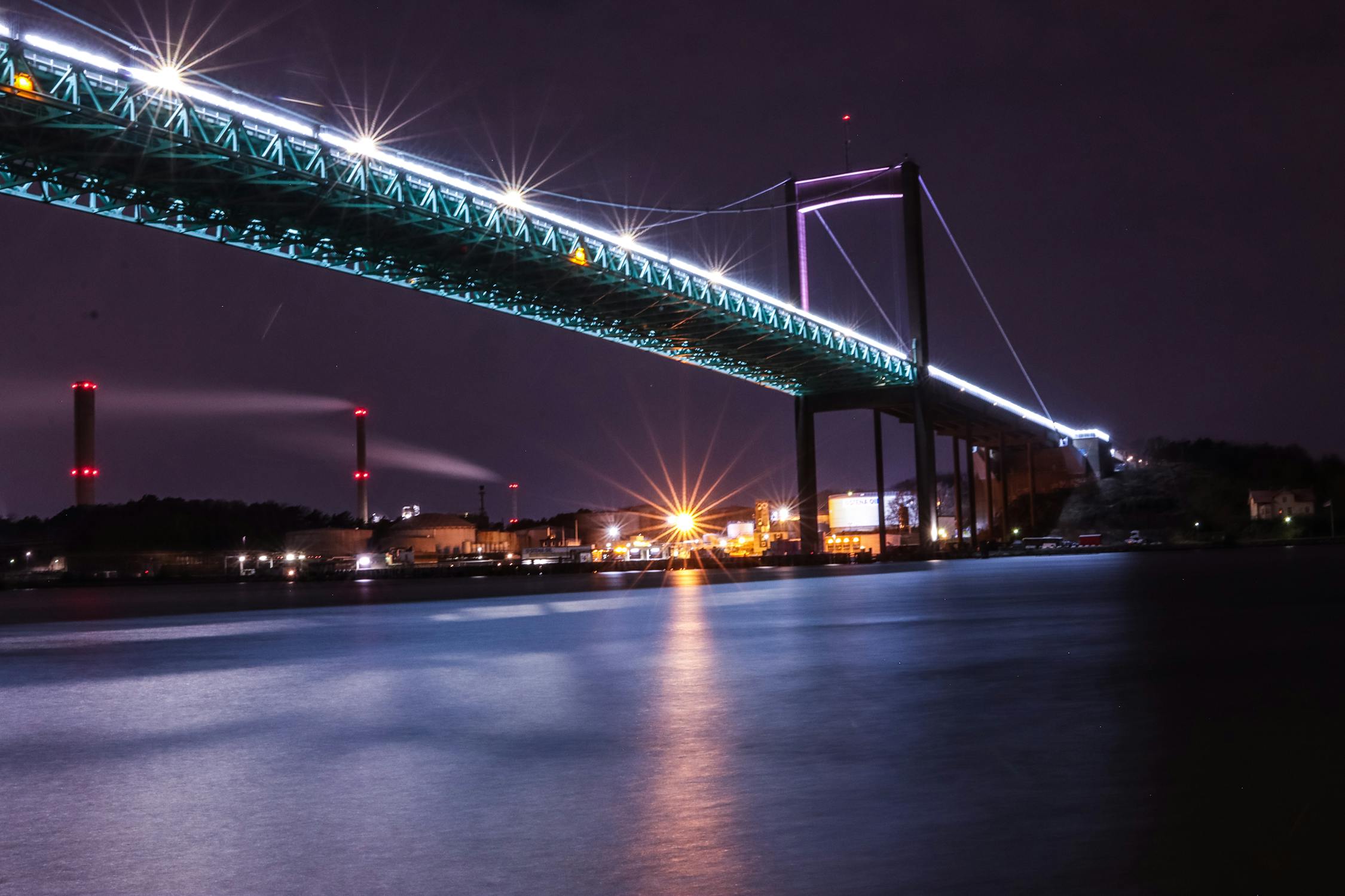 The illuminated Alvsborg Bridge at night in Gothenburg