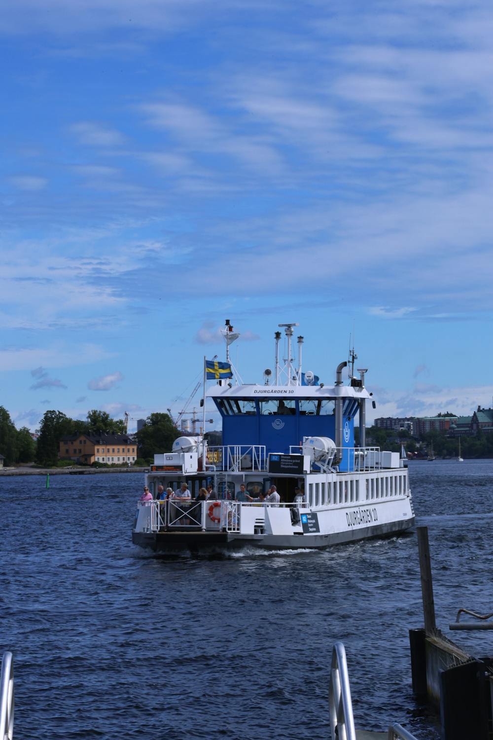 A passenger ferry crossing the Stockholm archipelago waters