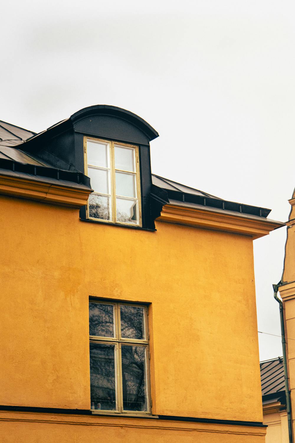 Classic yellow facade of a historic Uppsala building