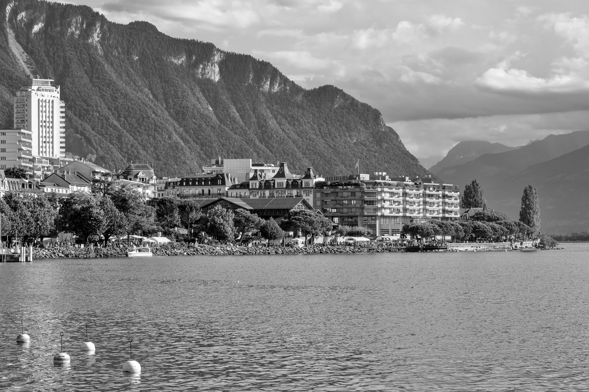 The towers of Château de Chillon reflected in Lake Geneva