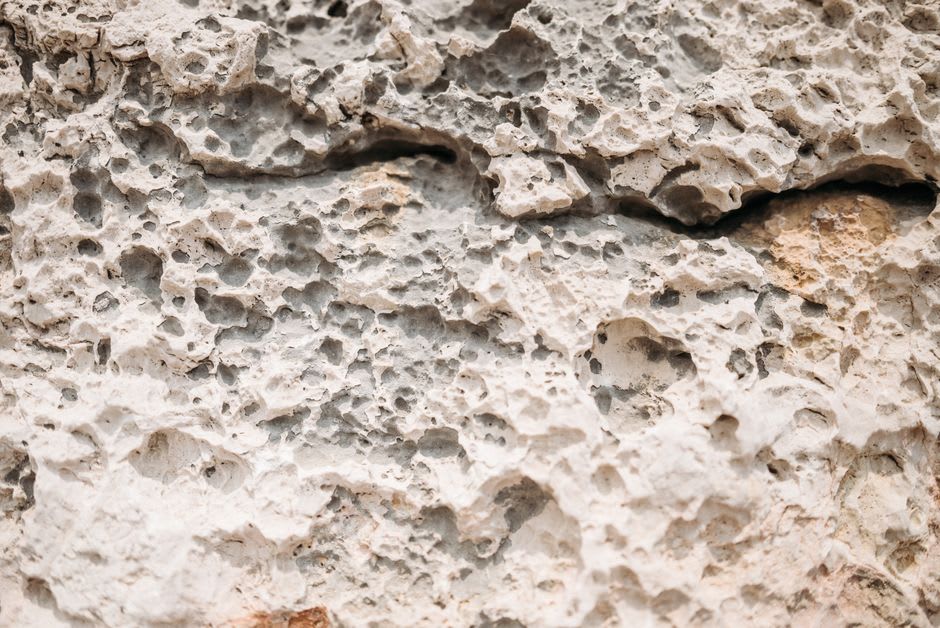 Wind-eroded coral limestone rock formations along the coastal trail at Sanxiantai