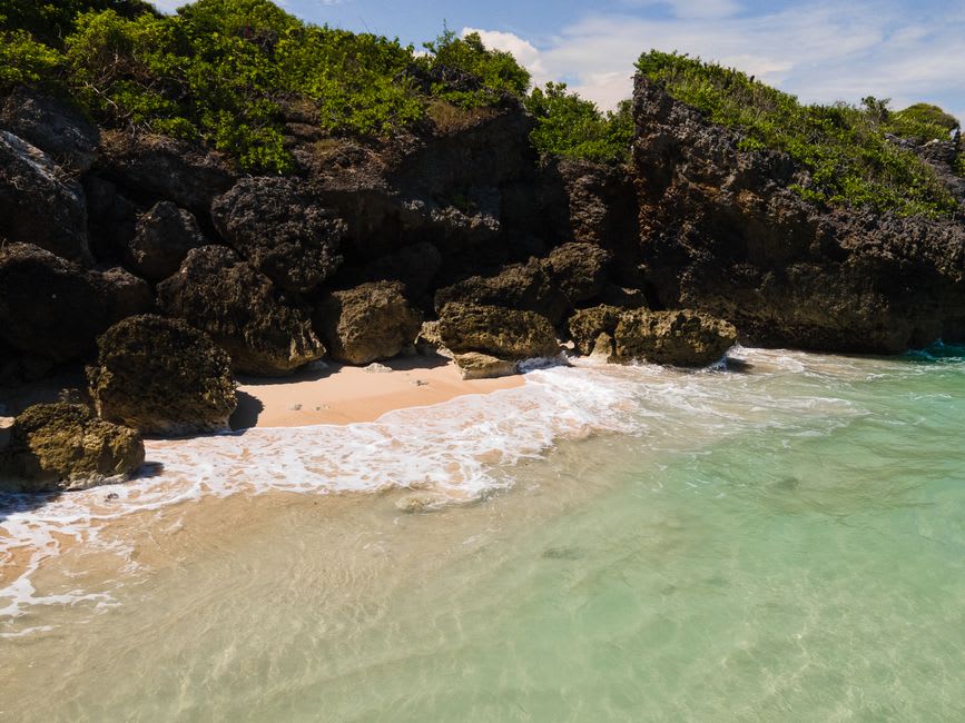 The coral outcrop known as Vase Rock rising from the shallow water off Xiaoliuqiu's coastline