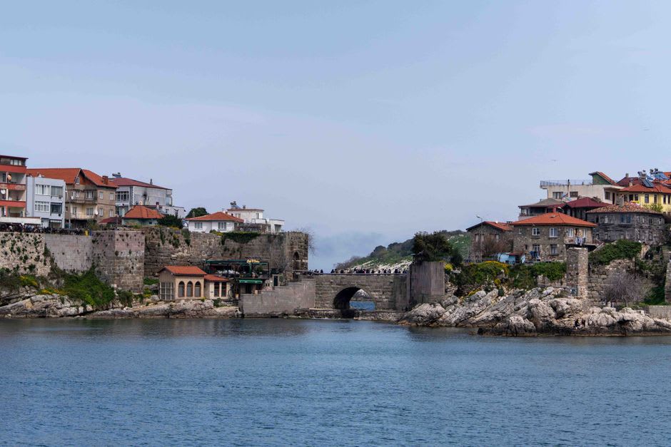 The narrow stone bridge connecting Amasra's old town to Boztepe island