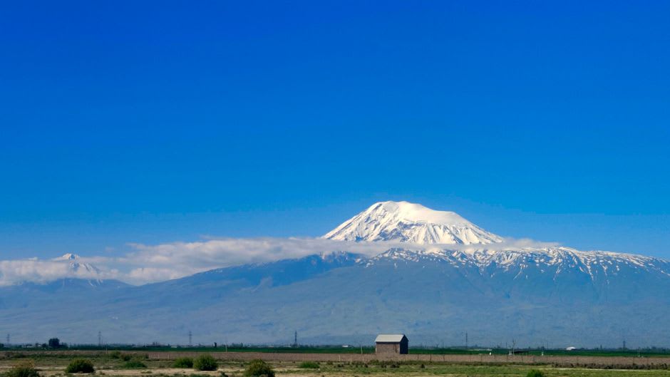 A distant view of Mount Ararat across the closed border river gorge, seen from the Ani ruins