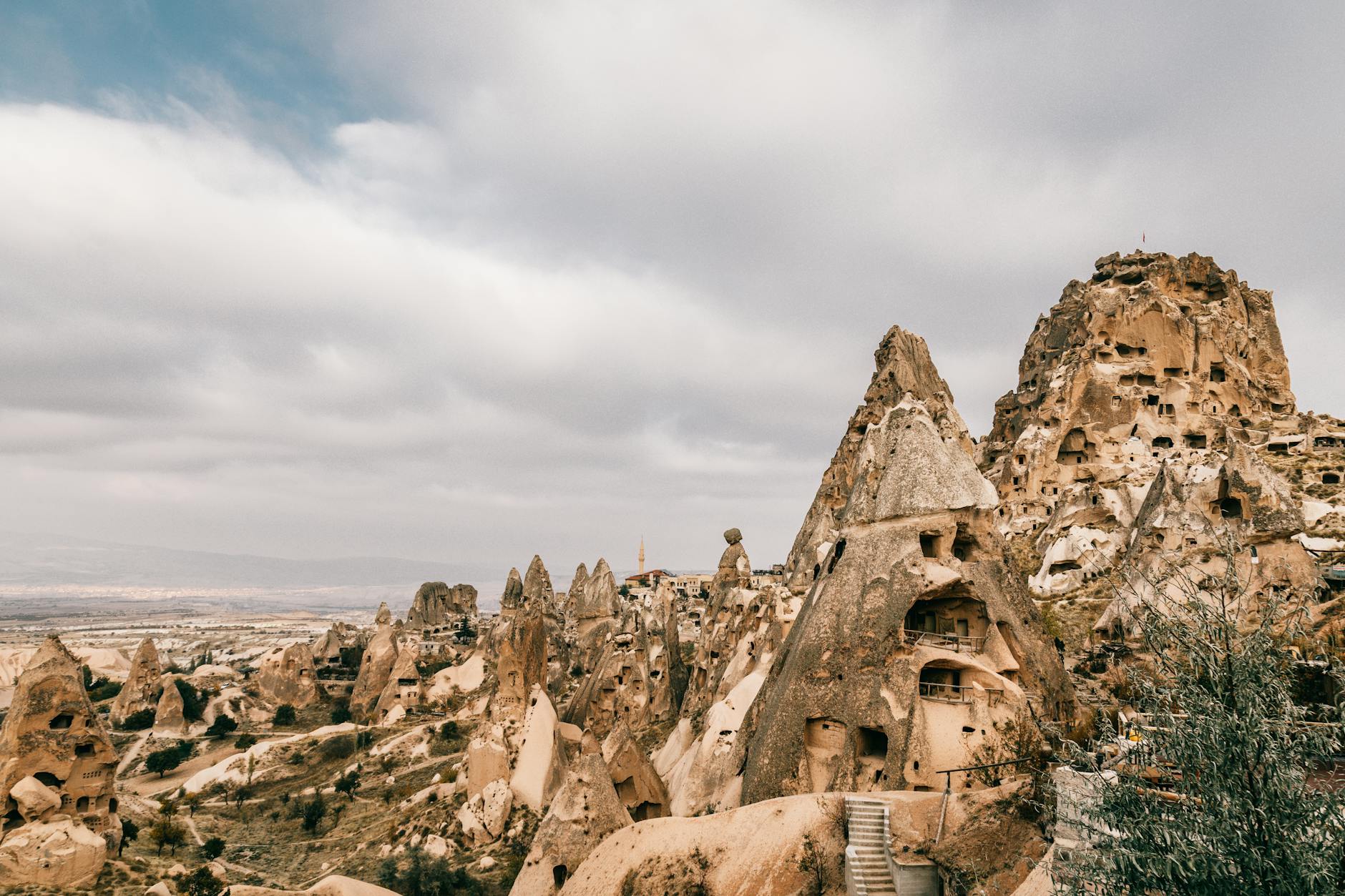 A cozy cave hotel room carved into Cappadocia's volcanic rock