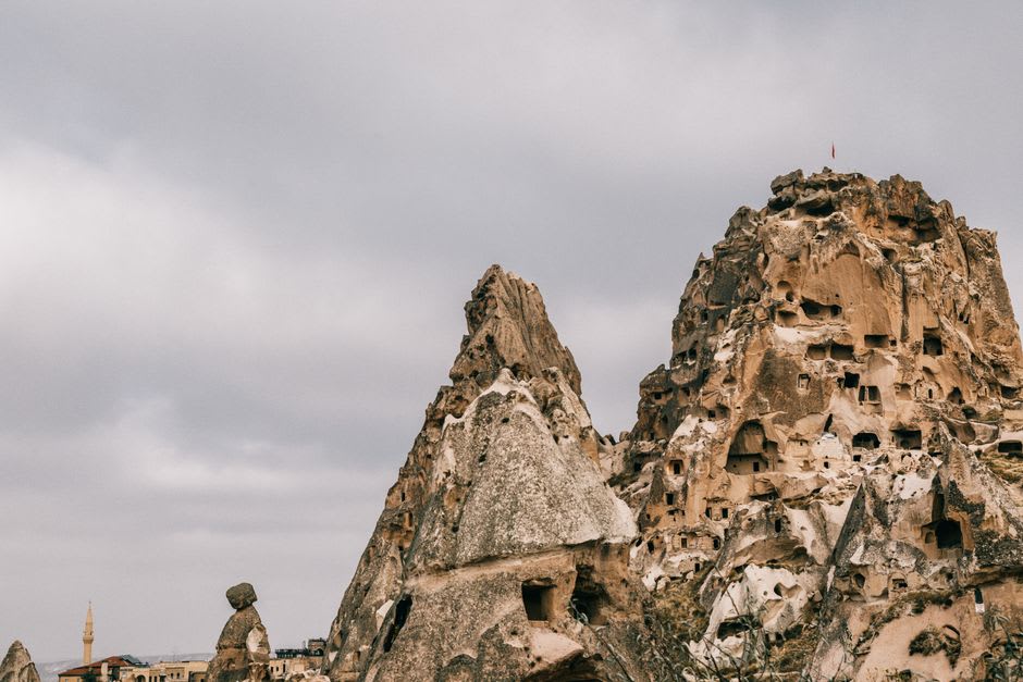 Cave dwellings and rock-cut houses built into the fairy chimneys of Goreme town