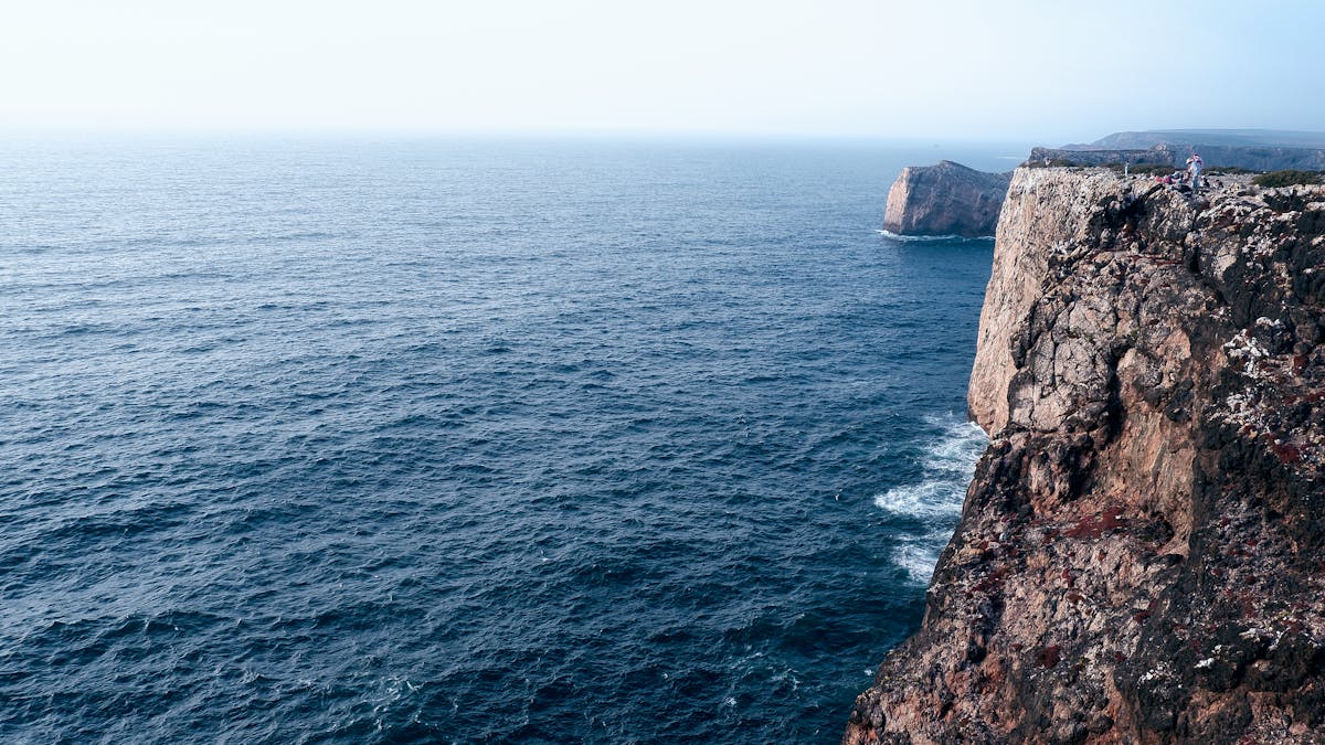 Rocky coastline with clear waters along the Gulf of Oman