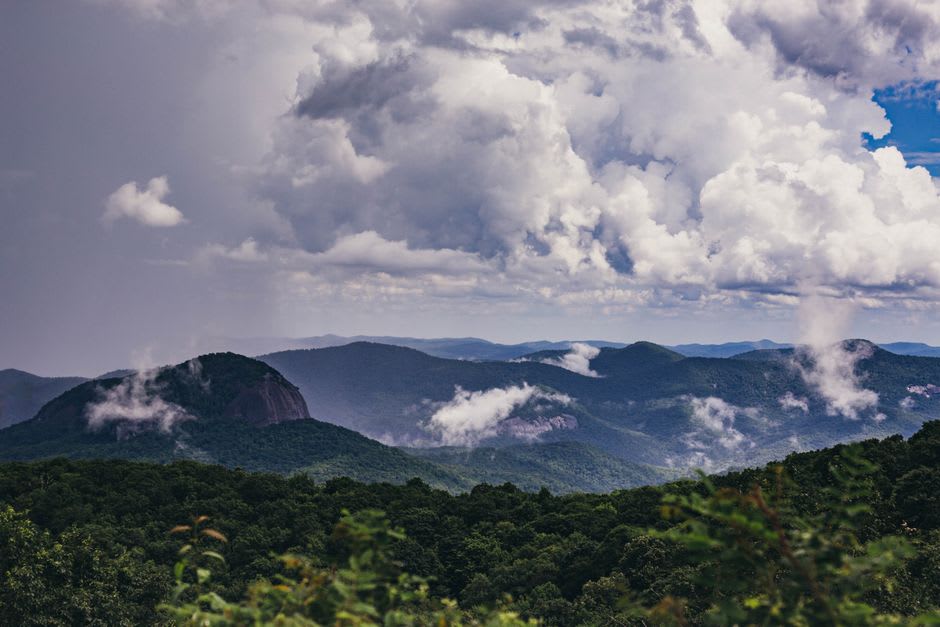 Layered blue ridges seen from the Blue Ridge Parkway above Asheville at dawn