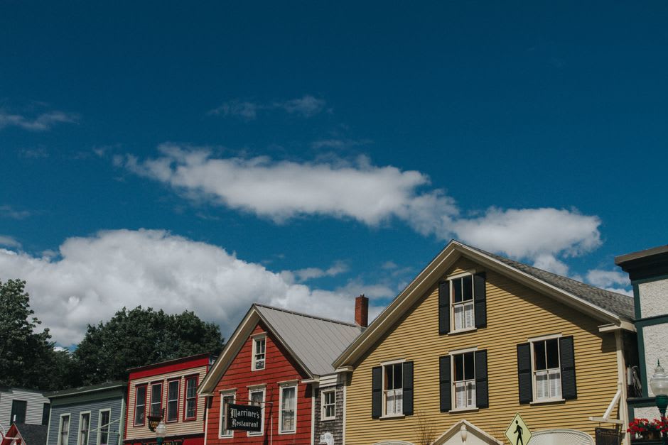 Brick storefronts and clapboard shops along Camden's small harborside downtown