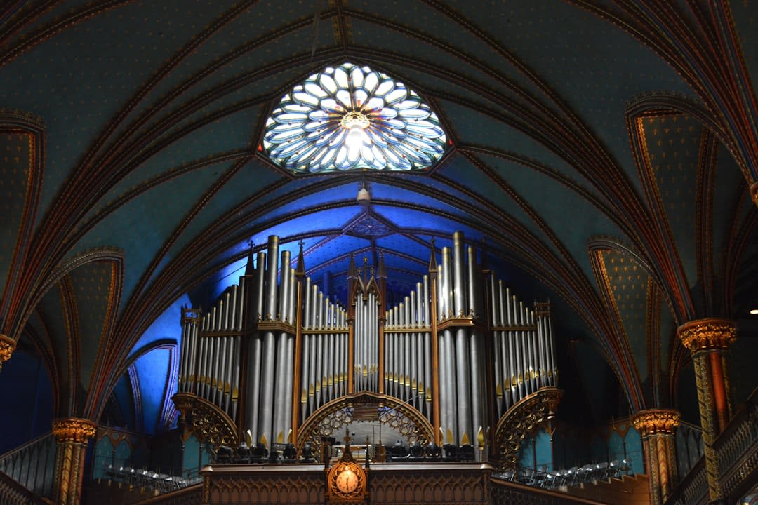 Stained glass windows and Gothic stone interior of the Cathedral Basilica of the Assumption in Covington, Kentucky