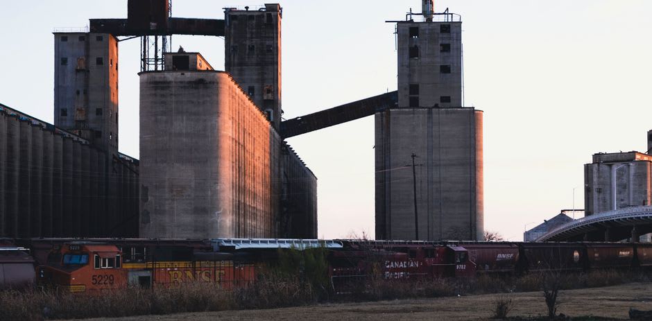 Old rice mill grain elevators near the rail line on the edge of Crowley, Louisiana