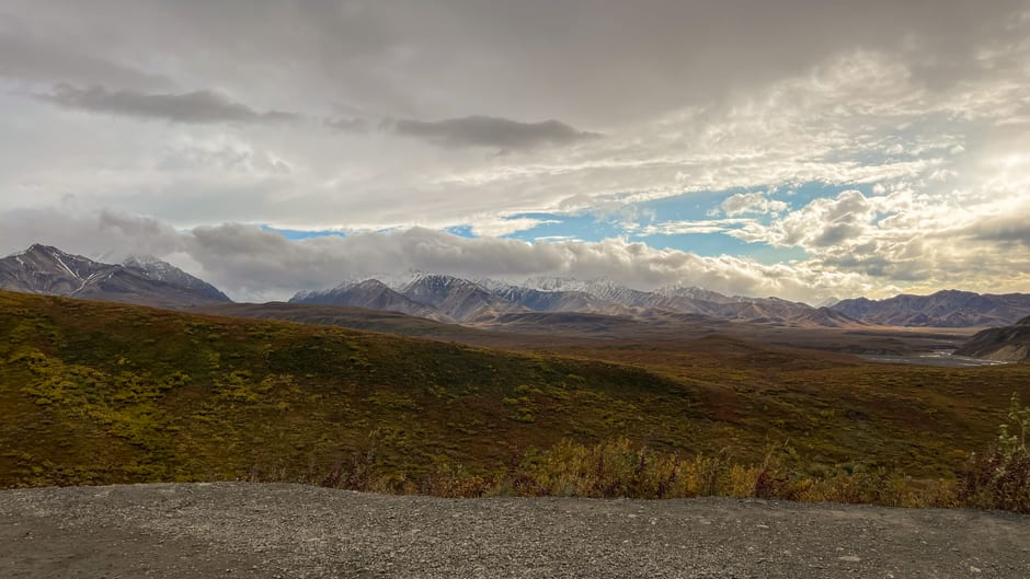 Denali's summit reflected in the still water of Wonder Lake at day's end