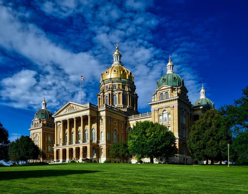 The ornate rotunda and grand staircase inside the Iowa State Capitol in Des Moines