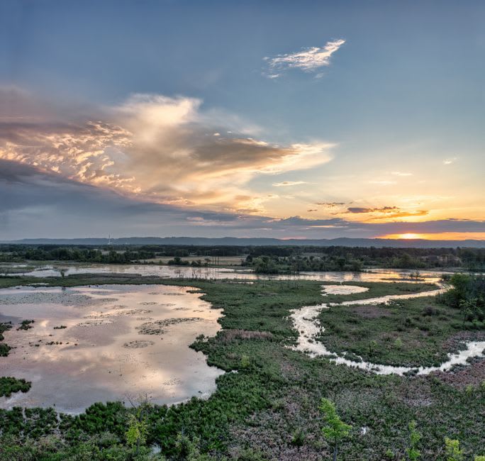 Sunset light over Patterson Lake and the surrounding grassland near Dickinson, North Dakota