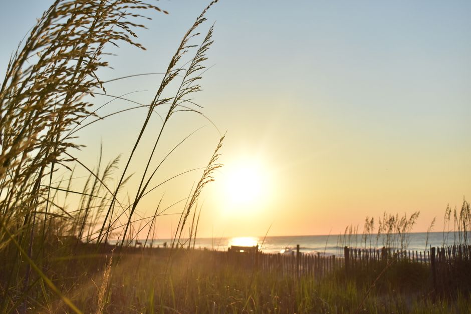 Sunrise over the dunes and shark-tooth-strewn sand at Edisto Beach, South Carolina