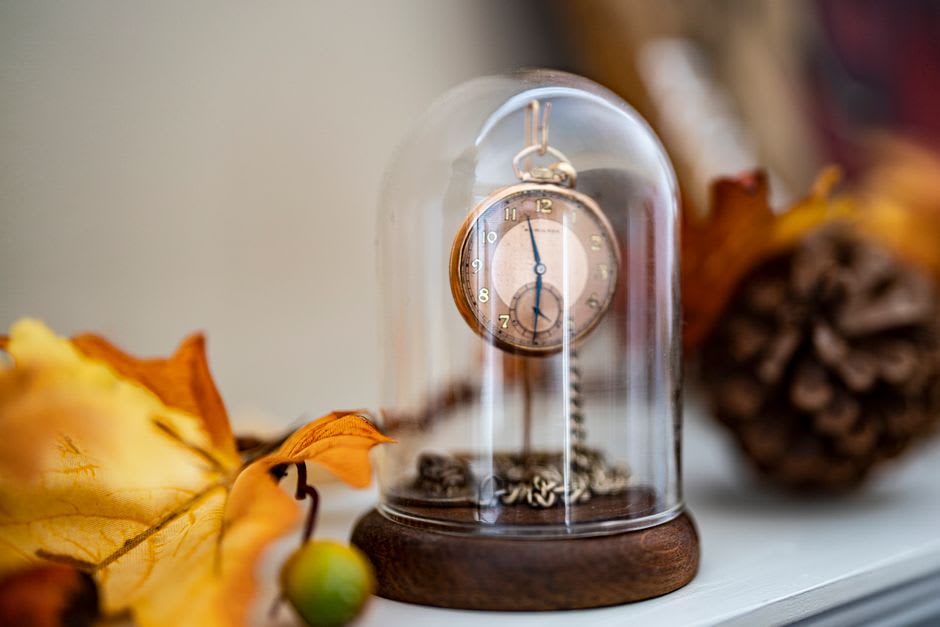 Antique Elgin pocket watches displayed in a glass case at the Elgin History Museum in Elgin, Illinois