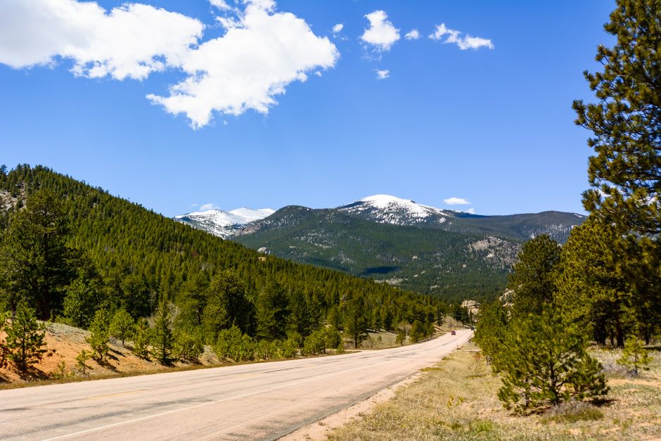 The white Colonial-Revival facade of the Stanley Hotel on the hill above Estes Park