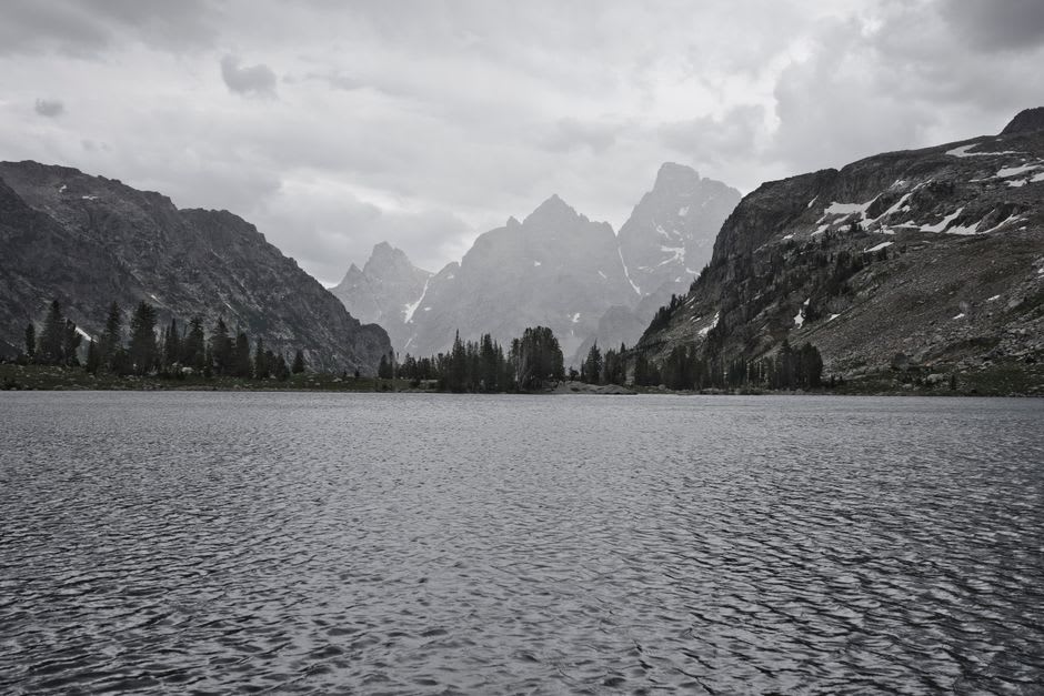 Jenny Lake reflecting the sharp Teton peaks on a windless morning