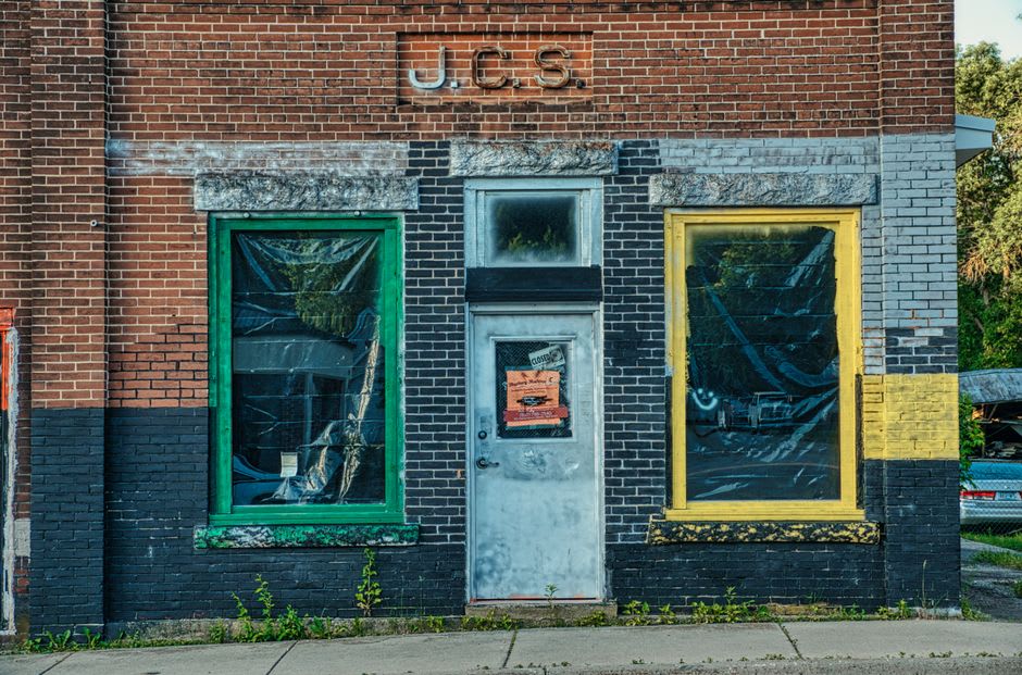A colorful Kool-Aid Man mural painted on a brick building in downtown Hastings, Nebraska