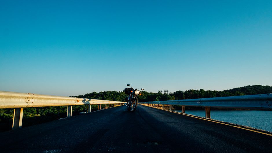 Motorcycles cruising along the lakefront road at Weirs Beach in Laconia, New Hampshire