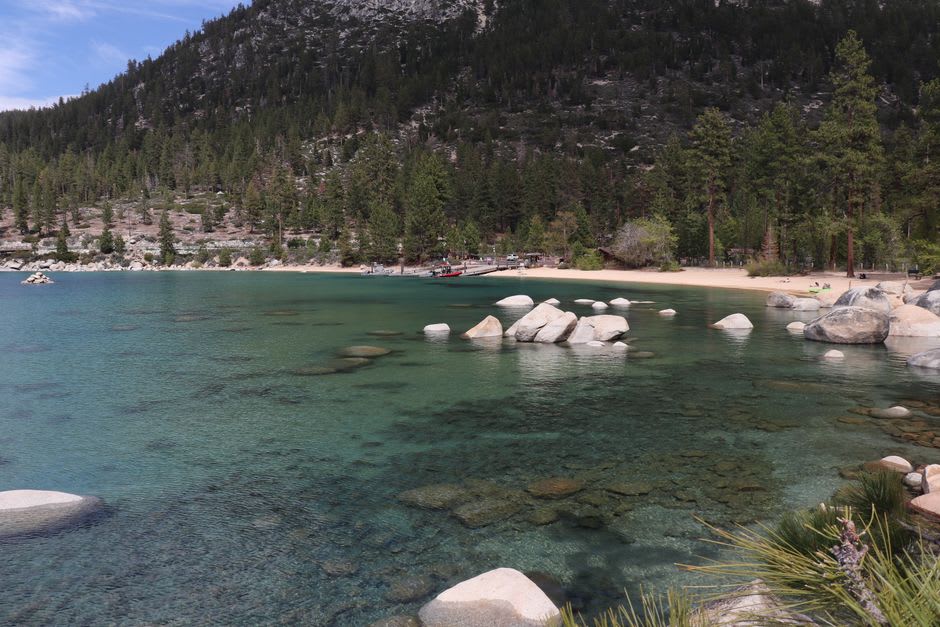 The turquoise waters of Emerald Bay with tiny Fannette Island and its stone teahouse ruin, seen from the high overlook on Lake Tahoe's southwest shore