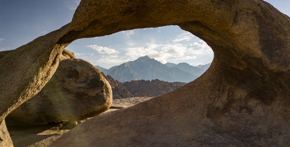 The Mobius Arch framing Mount Whitney in the Alabama Hills at dawn