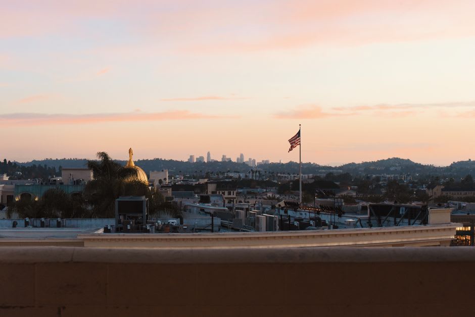 The Griffith Observatory above the Los Angeles basin with the city grid stretching to the horizon